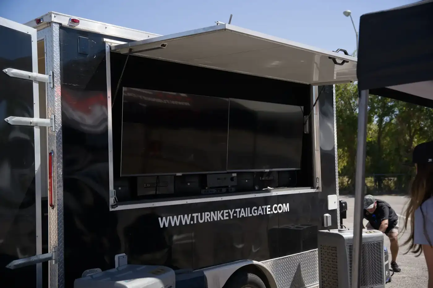 Dual 55" TVs on the trailer